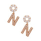 Creamy Comfort: Dangling N Earrings