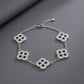 Black Encrusted Quatrefoil Motif Silver Bracelet